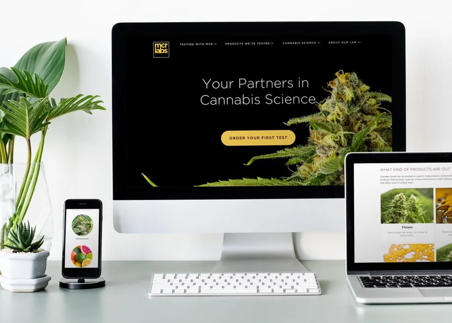 The redesigned MCR Labs site on a monitor, laptop and phone: Your Partners in Cannabis Science.